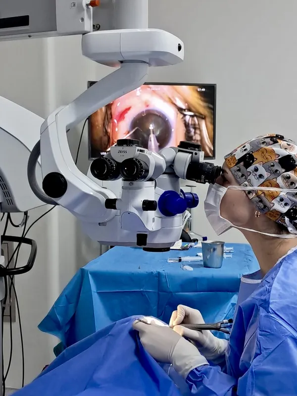 Surgical microscope view of an eye on the operating room monitor